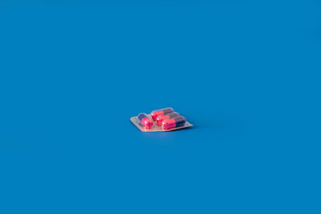 pills on a blue background
